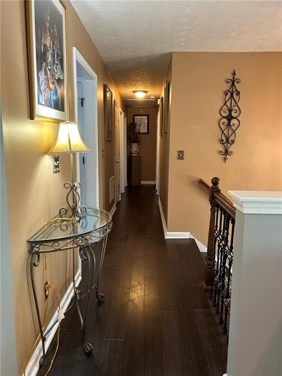 4197 Wyndham Ridge Court Northeast Buford, GA 30519 - Photo 21 of 49 a view of a hallway with workspace