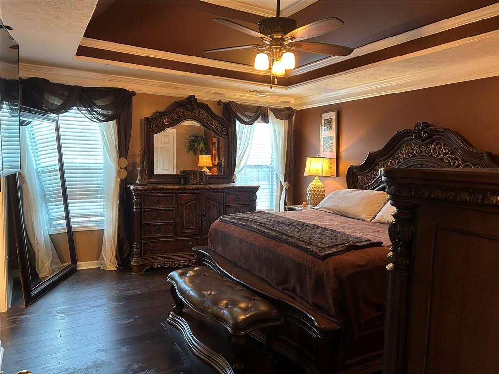 4197 Wyndham Ridge Court Northeast Buford, GA 30519 - Photo 28 of 49 a bedroom with a bed and a television