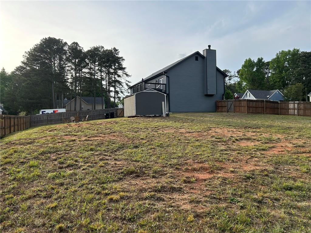 4197 Wyndham Ridge Court Northeast Buford, GA 30519 - Photo 45 of 49 a backyard of a house