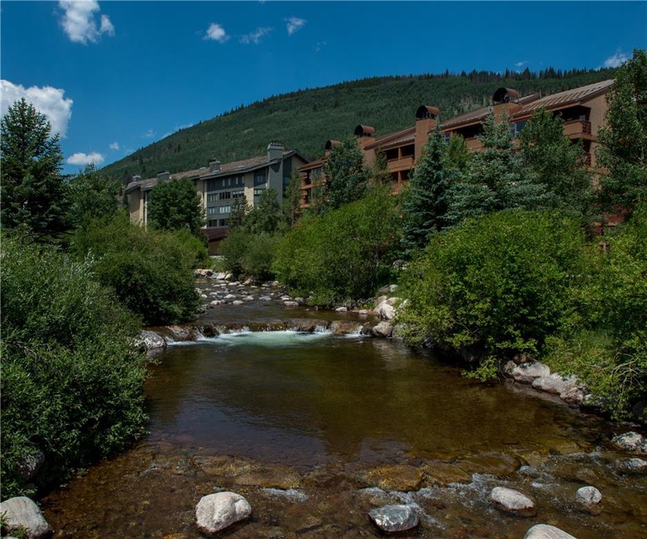 a view of a lake with outdoor space