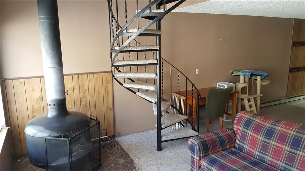 860 Copper Road, Unit 105 Copper Mountain, CO 80443 - Photo 13 of 23 a view of entryway with wooden floor