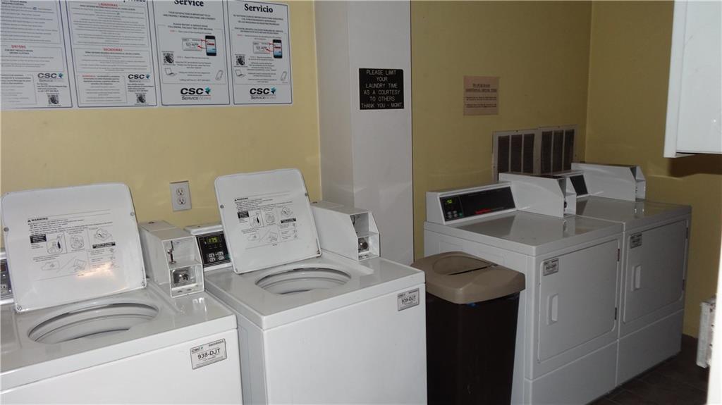 860 Copper Road, Unit 105 Copper Mountain, CO 80443 - Photo 15 of 23 a utility room with dryer and washer