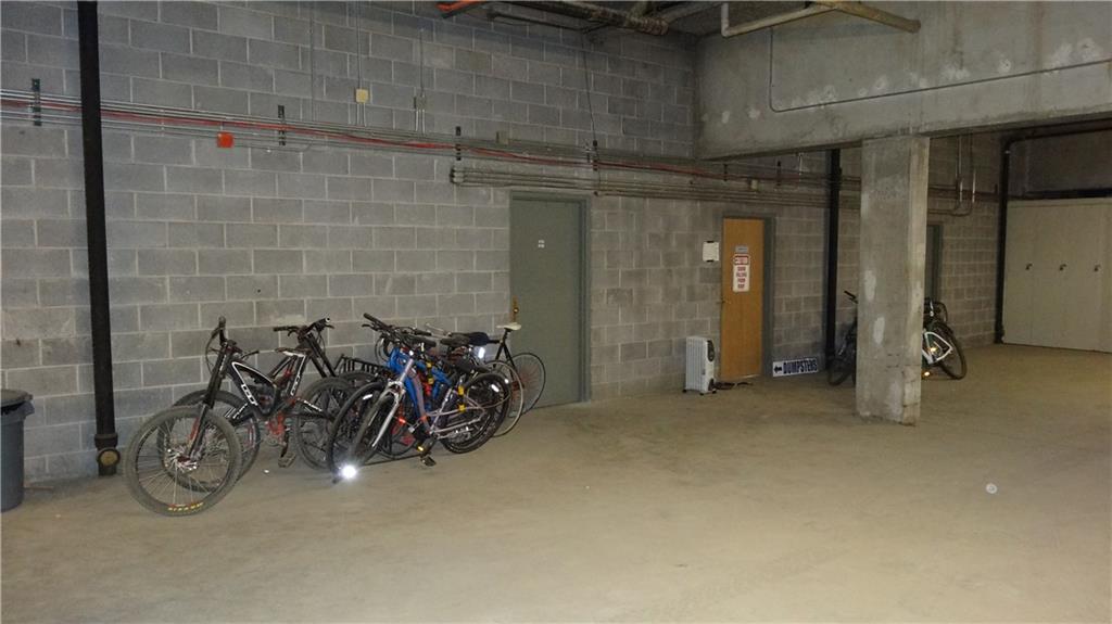 860 Copper Road, Unit 105 Copper Mountain, CO 80443 - Photo 19 of 23 a view of a garage with a table and a chair