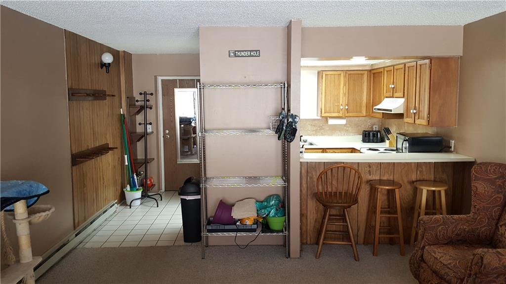 860 Copper Road, Unit 105 Copper Mountain, CO 80443 - Photo 3 of 23 a bathroom with a sink a mirror and a shower