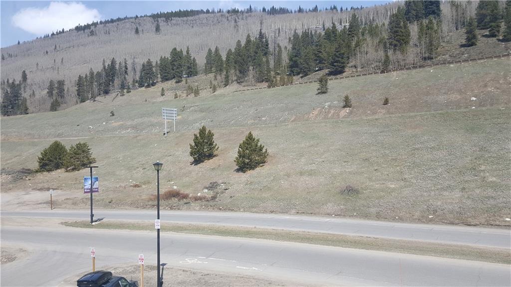 860 Copper Road, Unit 105 Copper Mountain, CO 80443 - Photo 21 of 23 a view of a road with a yard