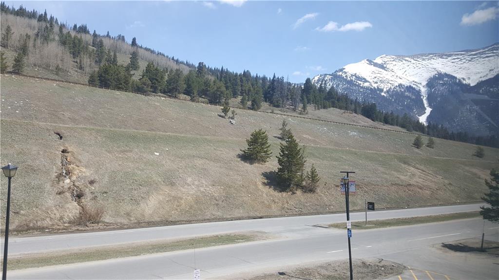 860 Copper Road, Unit 105 Copper Mountain, CO 80443 - Photo 22 of 23 a view of a road with mountains in the background