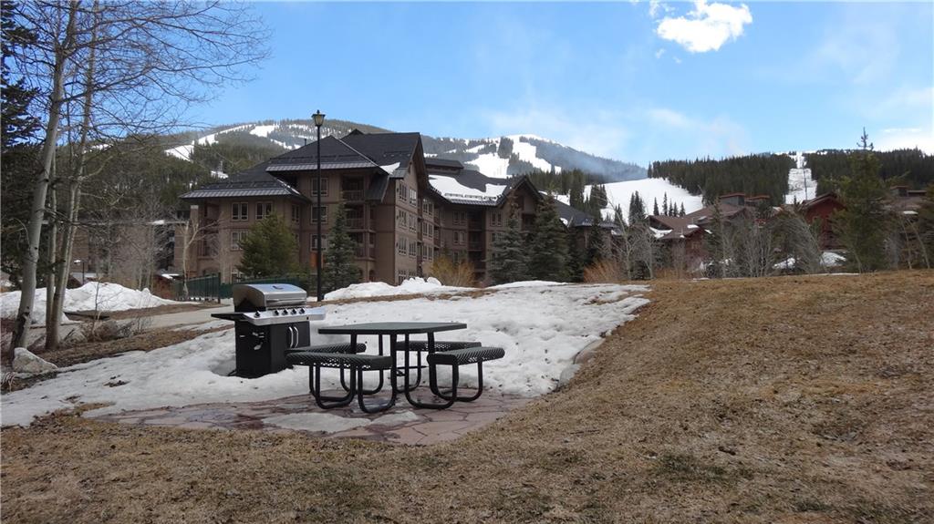 860 Copper Road, Unit 105 Copper Mountain, CO 80443 - Photo 10 of 23 a view of a house with backyard and sitting area