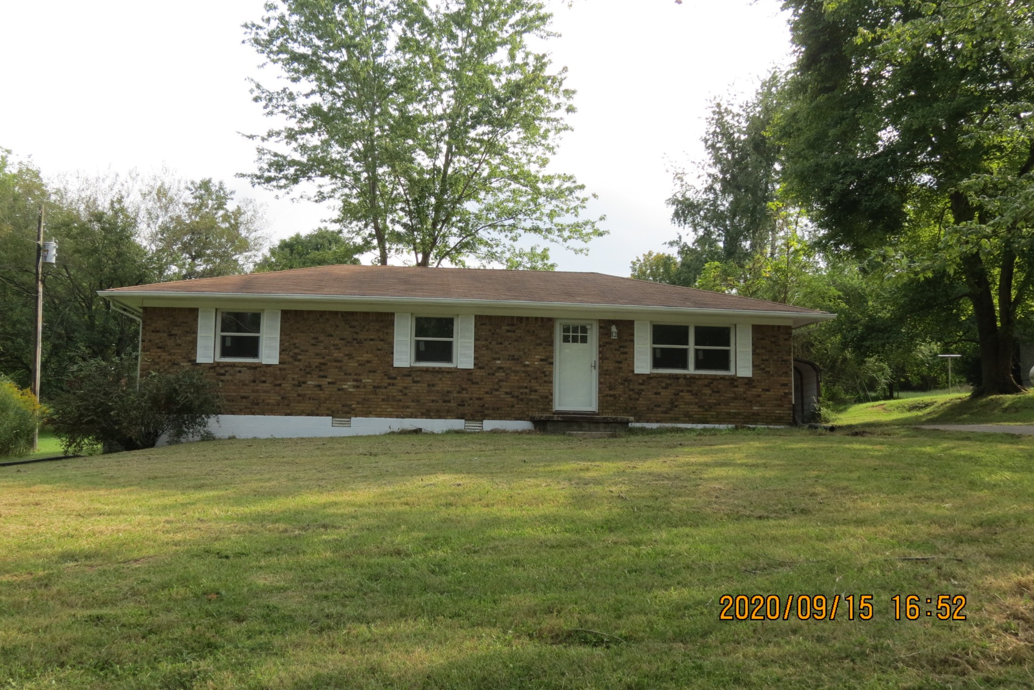 30 Pond Lane Tennessee Ridge, TN 37178 - Photo 2 of 7 a view of a house with a backyard