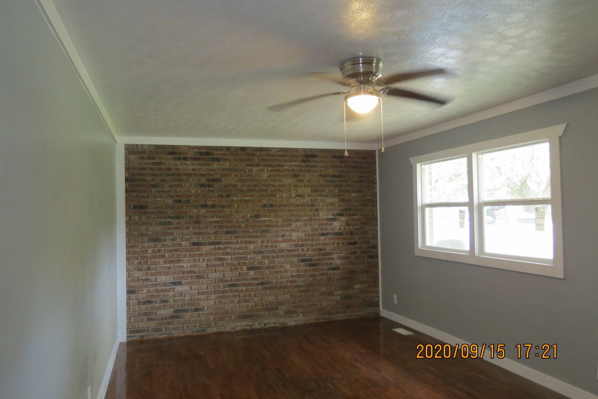 30 Pond Lane Tennessee Ridge, TN 37178 - Photo 3 of 7 a view of empty room with window and ceiling fan