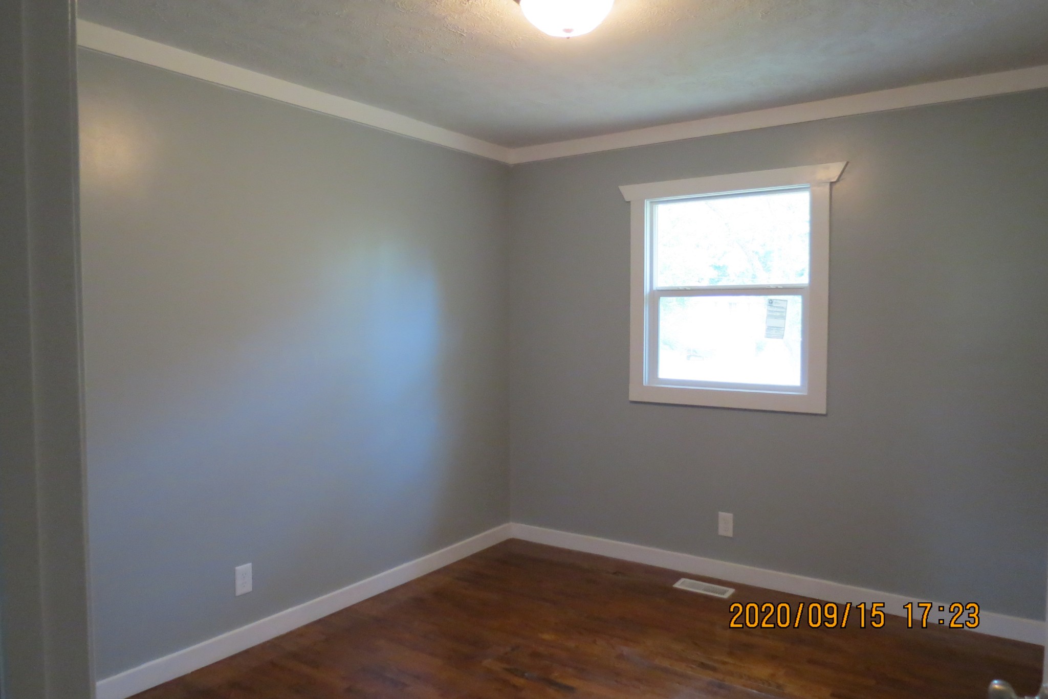 30 Pond Lane Tennessee Ridge, TN 37178 - Photo 5 of 7 an empty room with wooden floor and windows