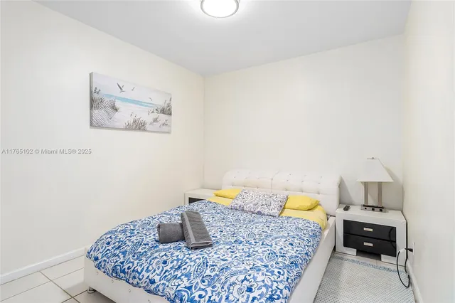 a bathroom with mirror and sink