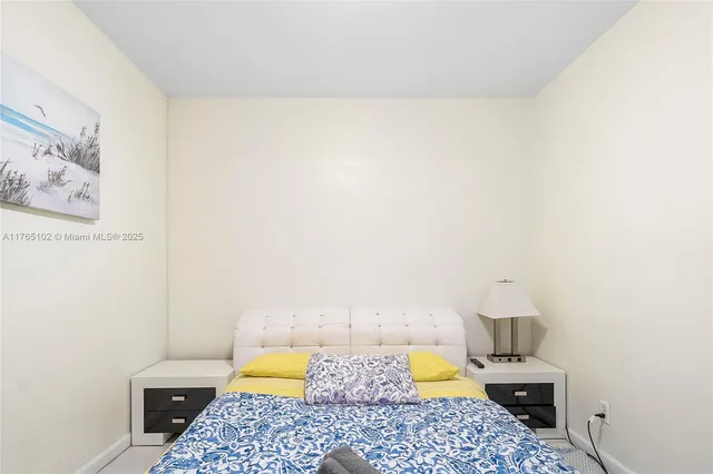 a kitchen with a stove a sink and a microwave