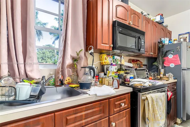a outdoor space with lots of furniture and a potted plant
