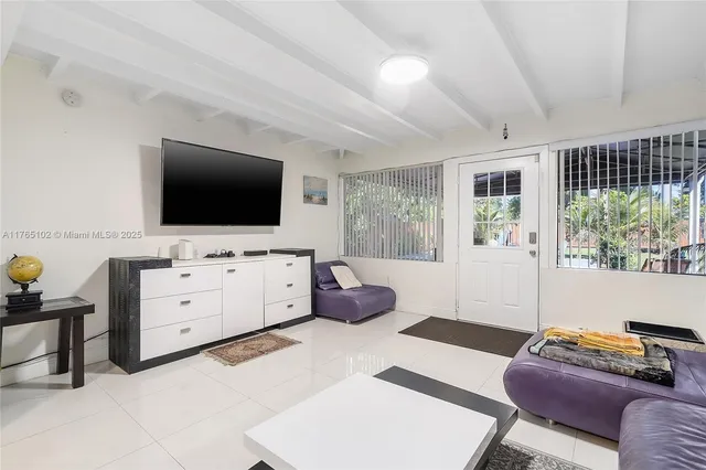 a kitchen with stainless steel appliances granite countertop a refrigerator sink and cabinets