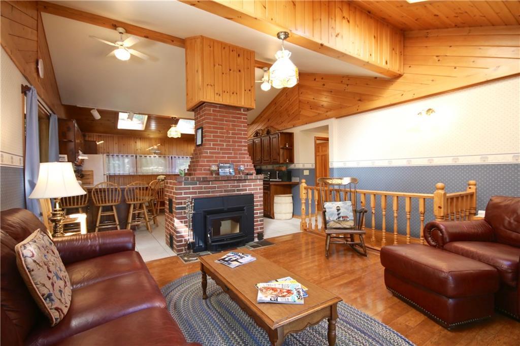 180 Thomas Pond Terrace Road Raymond, ME 04071 - Photo 22 of 35 Vaulted ceilings make the room feel...