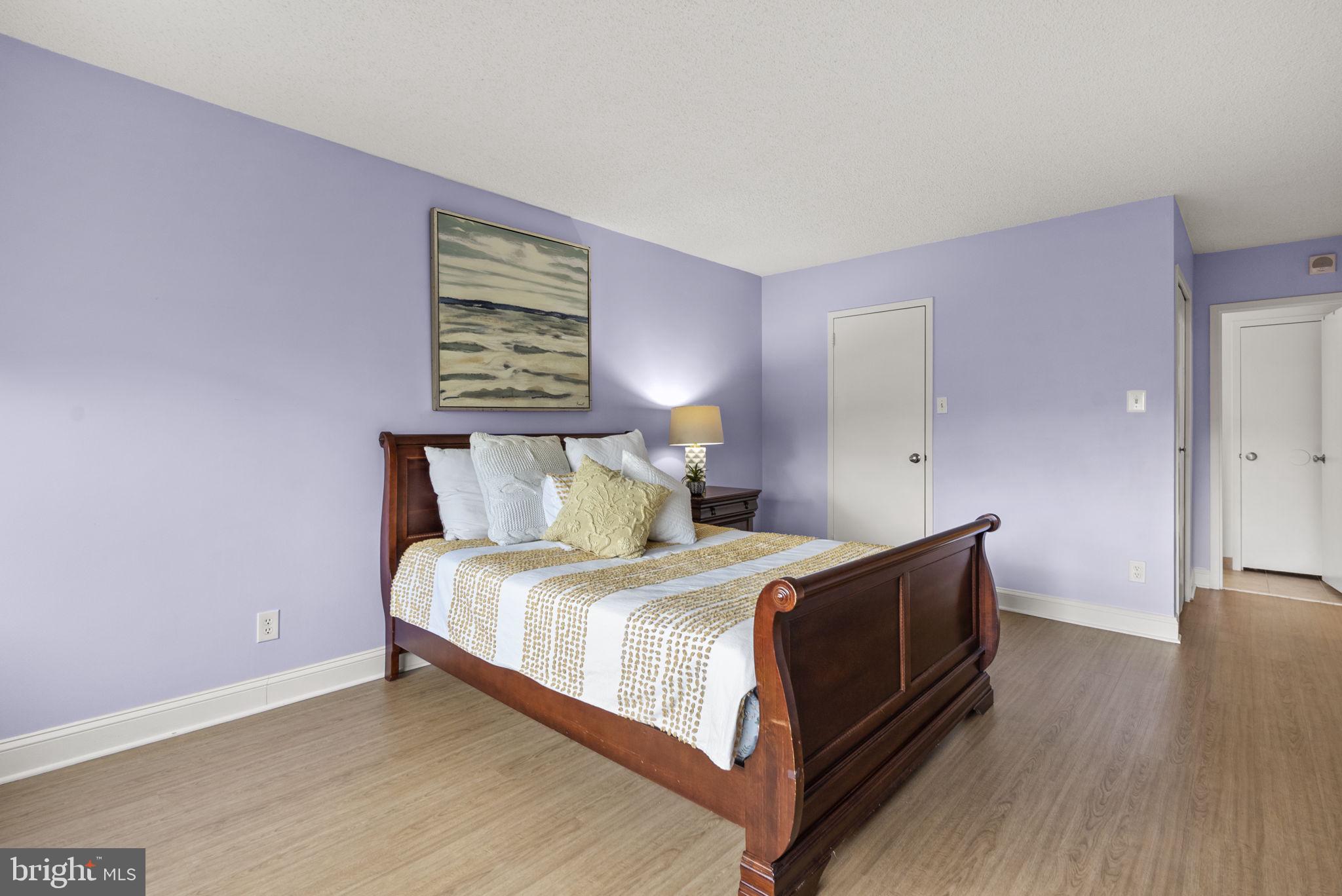 5225 Pooks Hill Road, Unit 804N Bethesda, MD 20814 - Photo 18 of 39 a bedroom with a bed and window