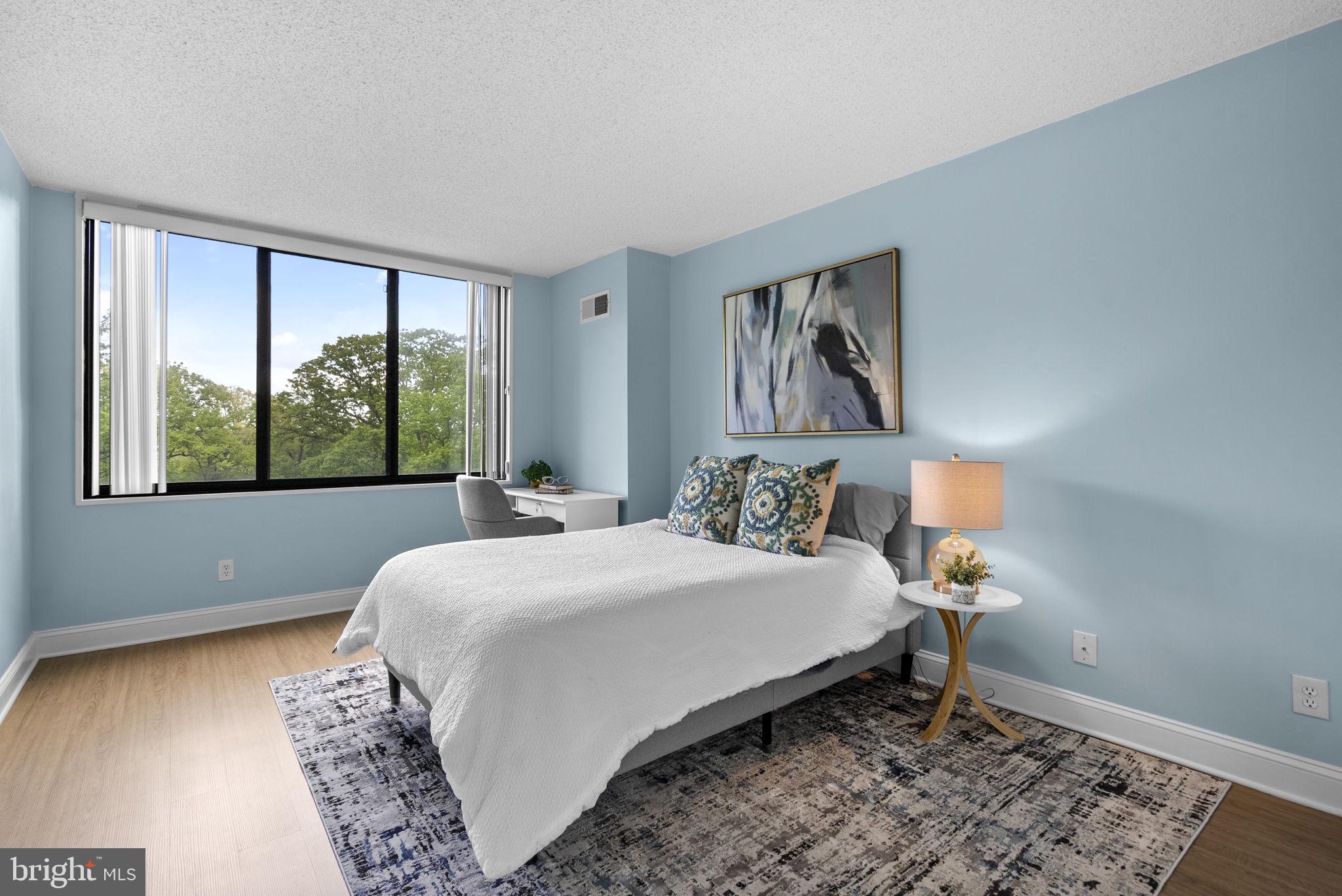 5225 Pooks Hill Road, Unit 804N Bethesda, MD 20814 - Photo 22 of 39 a bedroom with a bed and a window