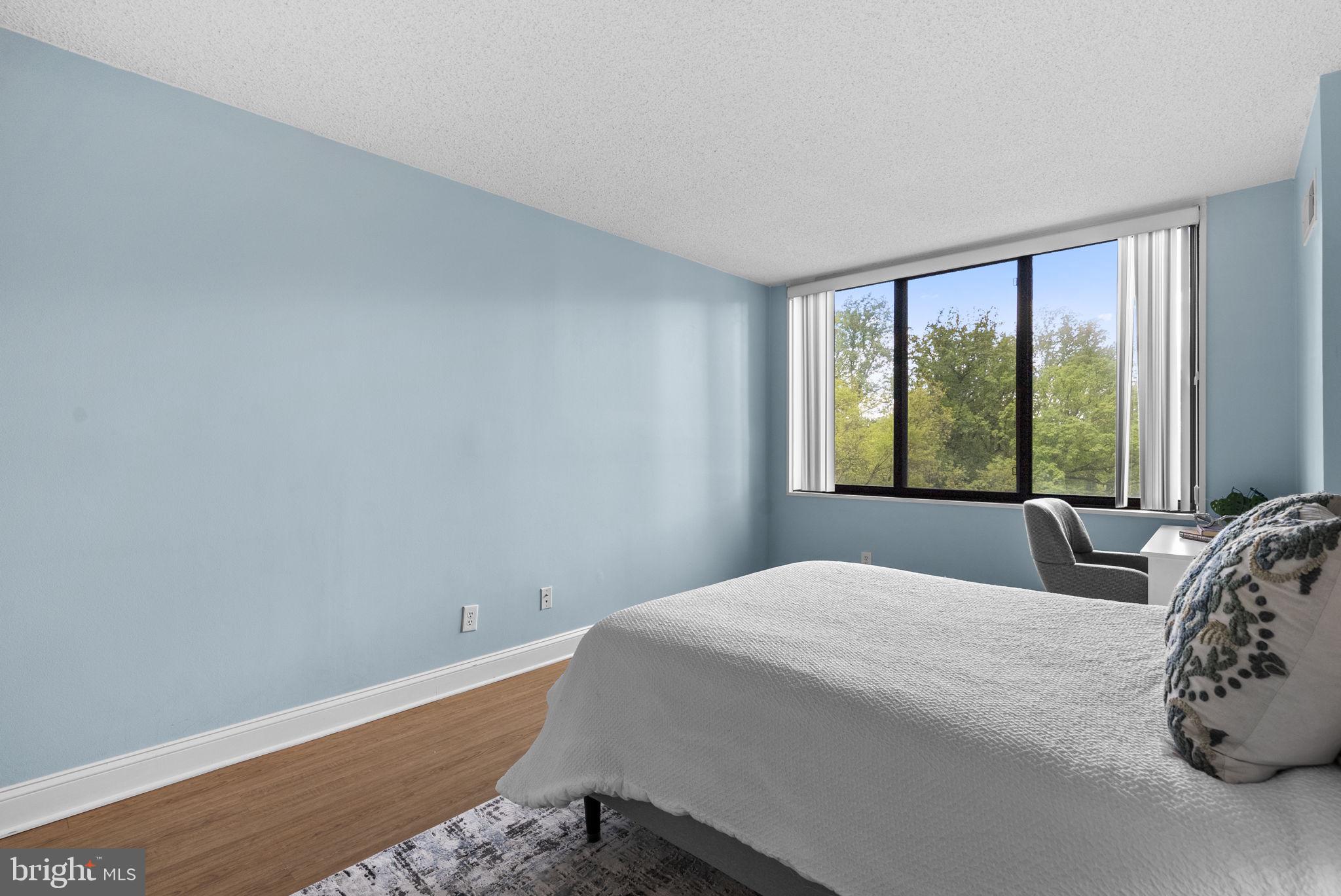 5225 Pooks Hill Road, Unit 804N Bethesda, MD 20814 - Photo 23 of 39 a bedroom with a bed and a window