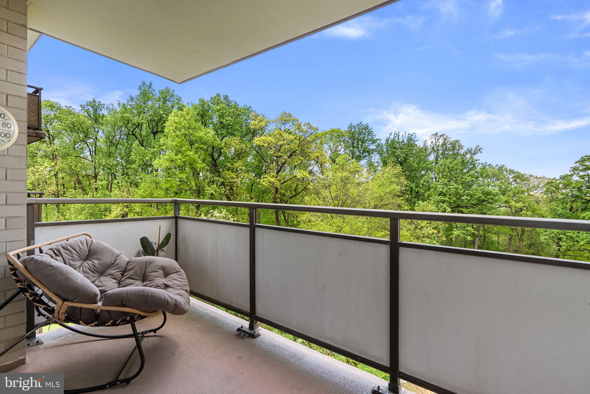 5225 Pooks Hill Road, Unit 804N Bethesda, MD 20814 - Photo 27 of 39 a balcony with furniture