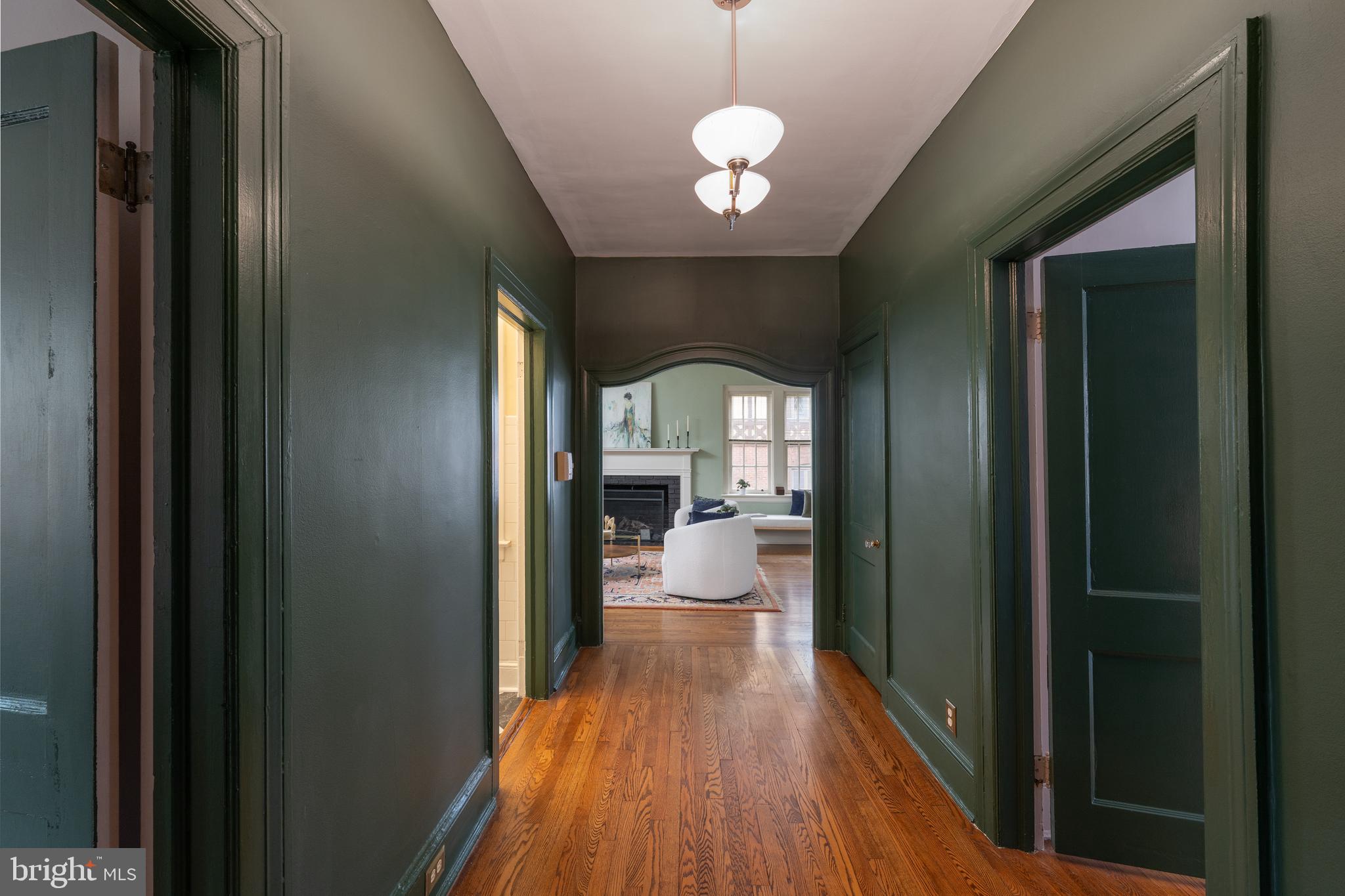 102 West 39th Street, Unit 2B Baltimore, MD 21210 - Photo 2 of 30 a view of a hallway with a livingroom and dining room view