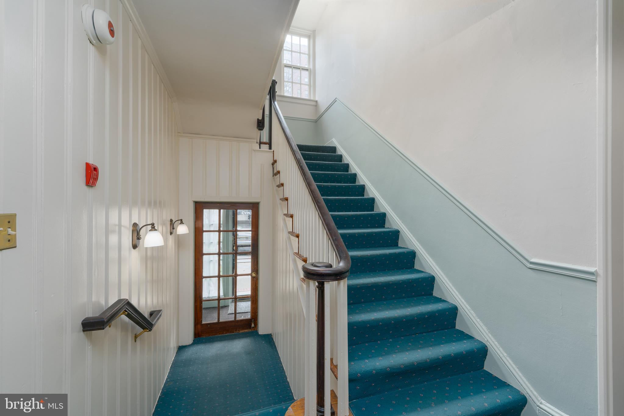 102 West 39th Street, Unit 2B Baltimore, MD 21210 - Photo 29 of 30 a view of entryway and hall with wooden floor