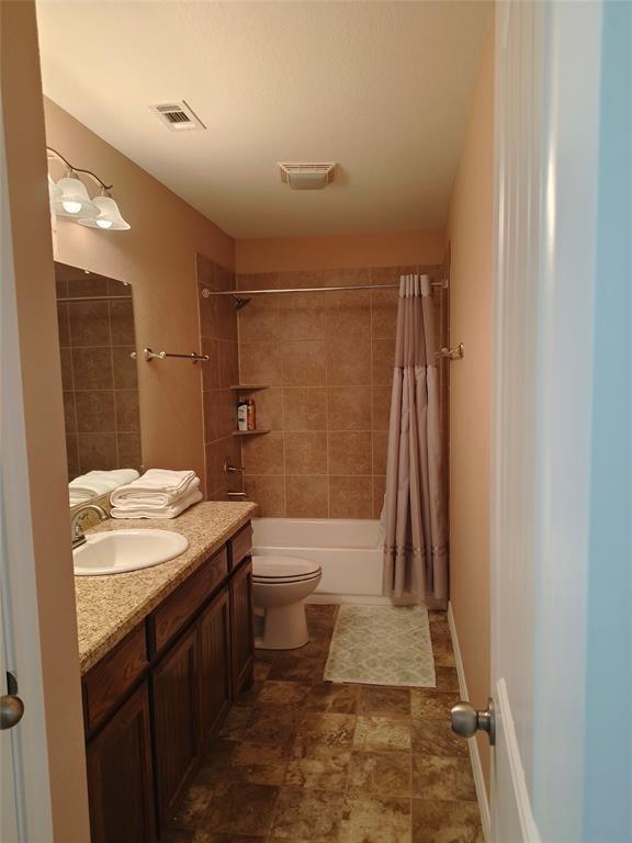100 East Bluebonnet Drive Cresson, TX 76035 - Photo 12 of 25 Bathroom with vanity and shower / bath combo