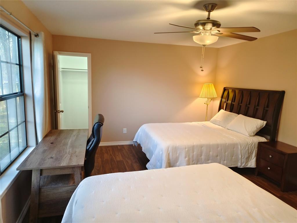 100 East Bluebonnet Drive Cresson, TX 76035 - Photo 9 of 25 Bedroom with dark wood-type flooring and a ceiling fan