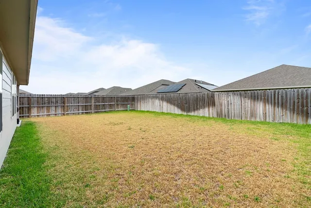 a view of a garden with a small yard