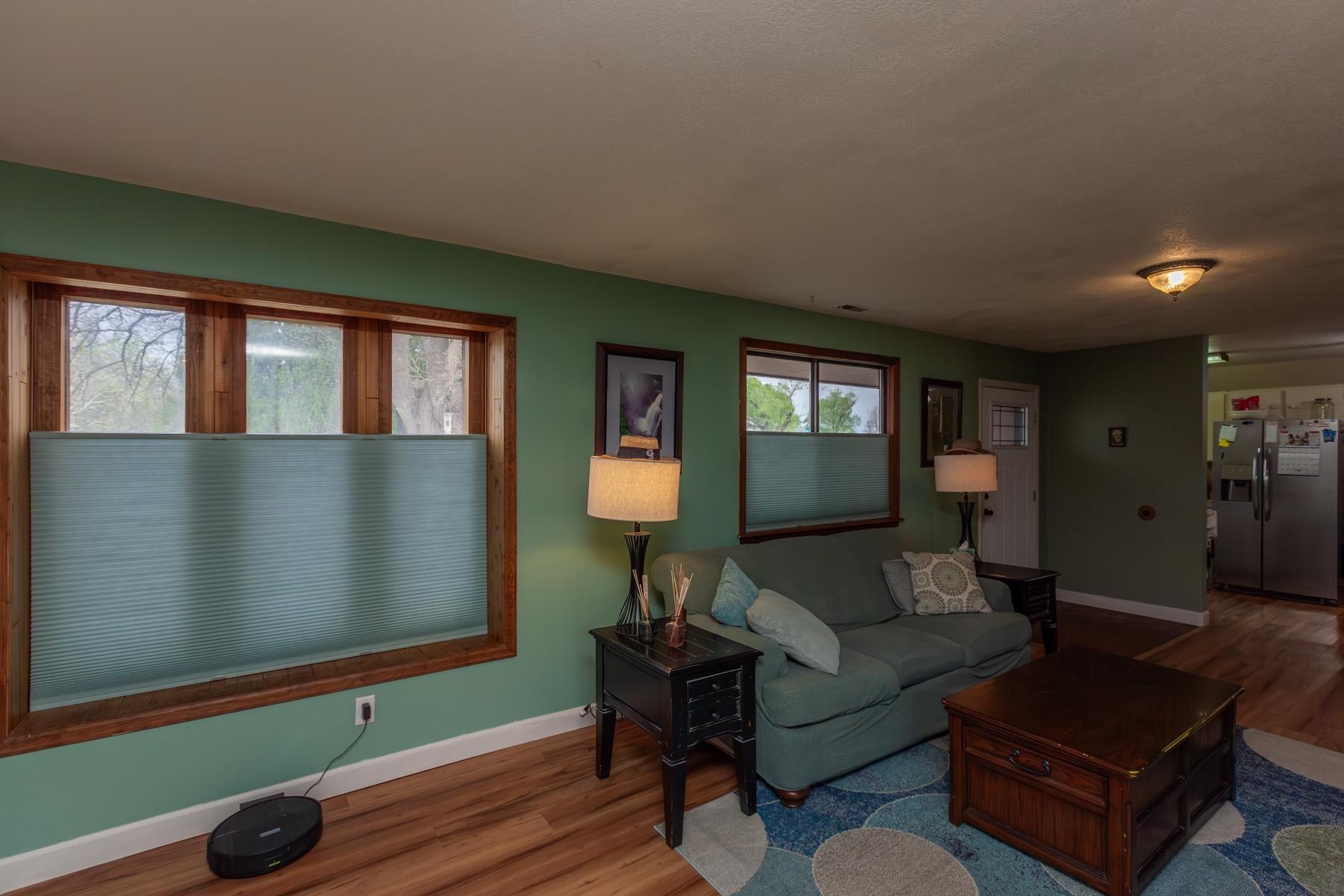 481-31 31 1/4 Road Grand Junction, CO 81504 - Photo 7 of 38 a living room with furniture and a wooden floor