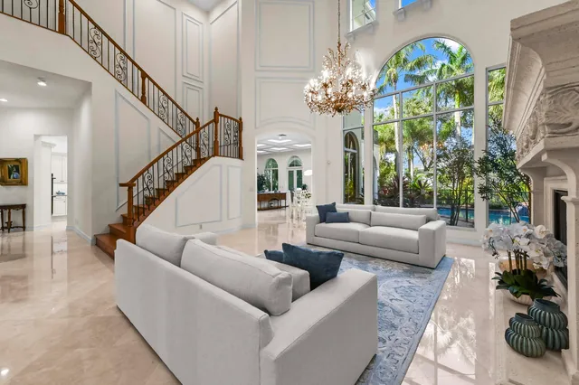 a view of a house with swimming pool and porch