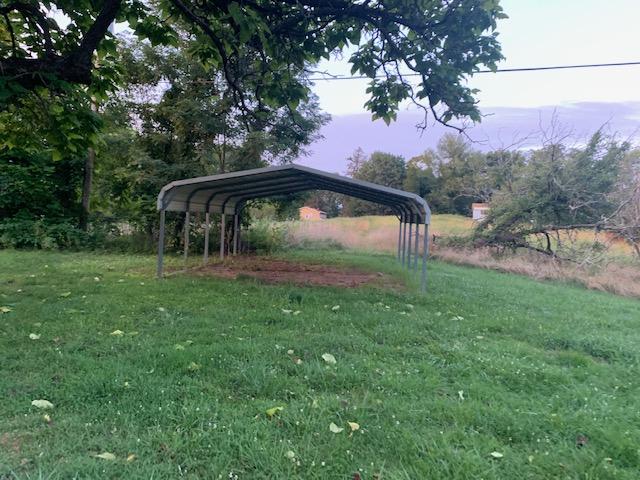 125 Dove Lane Blue Ridge, VA 24064 - Photo 14 of 18 a backyard of a house with lots of green space