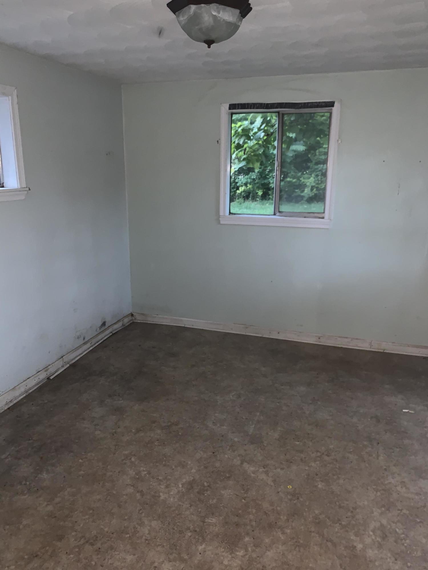 125 Dove Lane Blue Ridge, VA 24064 - Photo 8 of 18 an empty room with a window