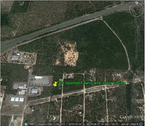 Tba Spotted Fawn Road Holt, FL 32564 - Photo 3 of 12 a view of a wooden bridge
