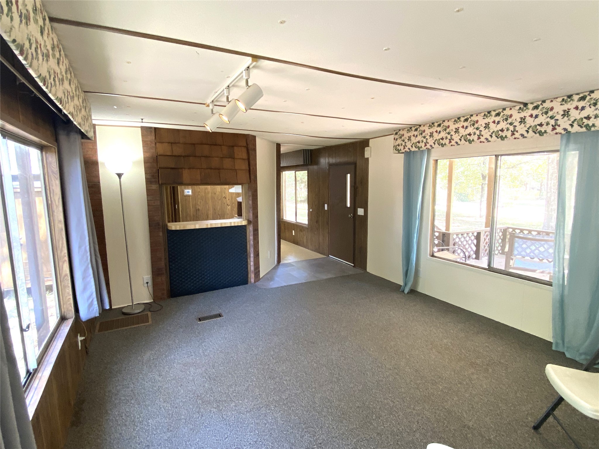 14662 Brooks Road Conroe, TX 77302 - Photo 12 of 23 a view of a room with a porch and furniture