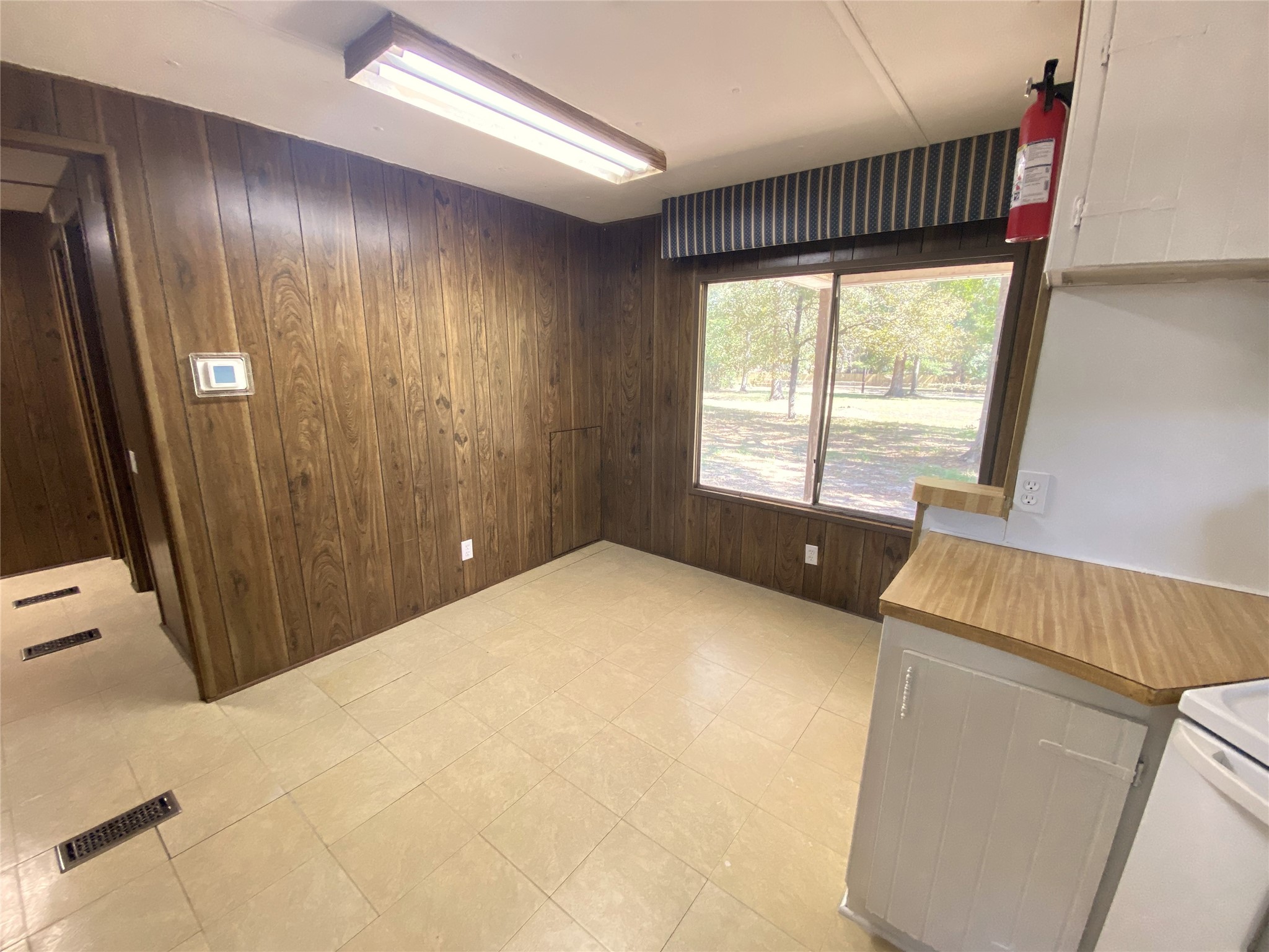 14662 Brooks Road Conroe, TX 77302 - Photo 17 of 23 a view of an empty room with a window