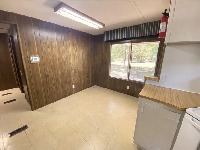 a view of a house covered in snow