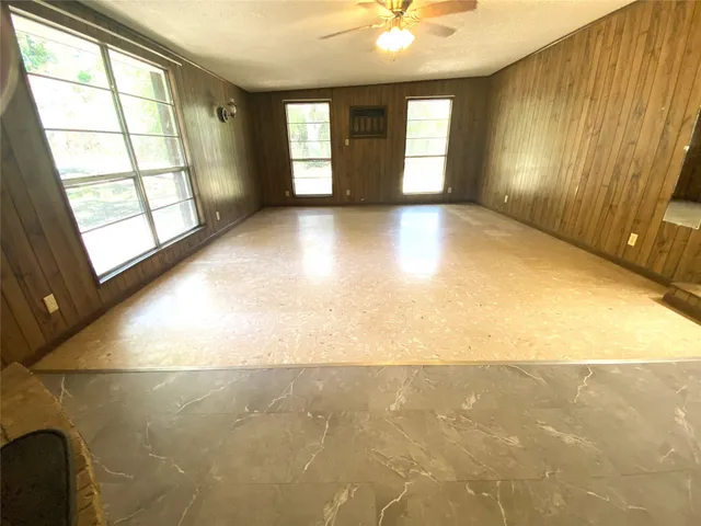 a view of hallway with a large mirror