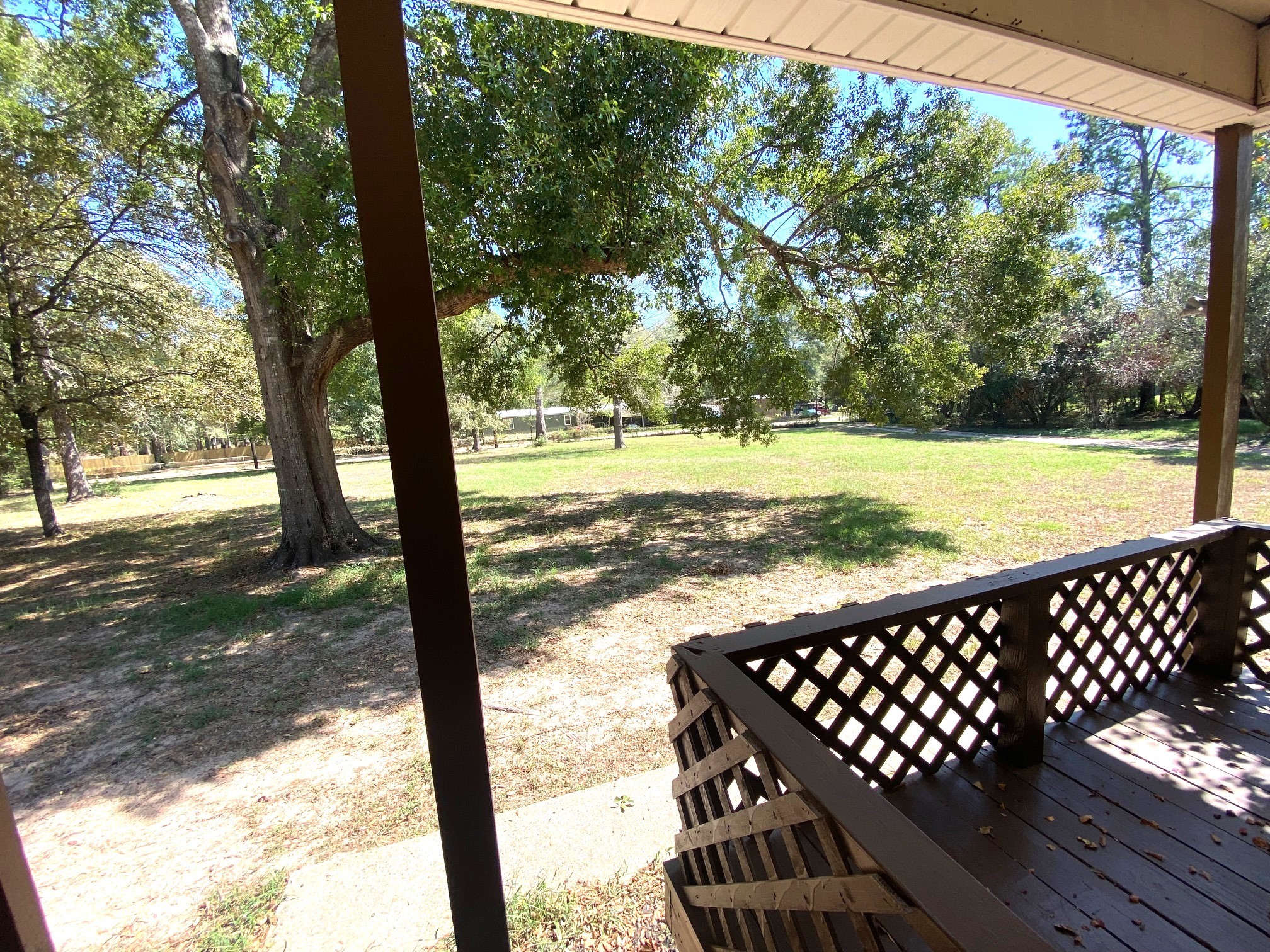 14662 Brooks Road Conroe, TX 77302 - Photo 21 of 23 a view of a patio with a yard