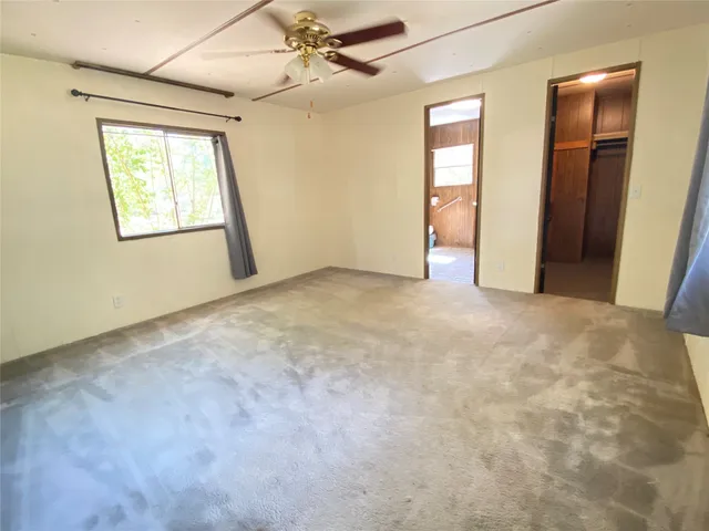 a bathroom with a bathtub a toilet and a shower