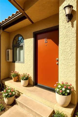 a view of a porch with a potted plant