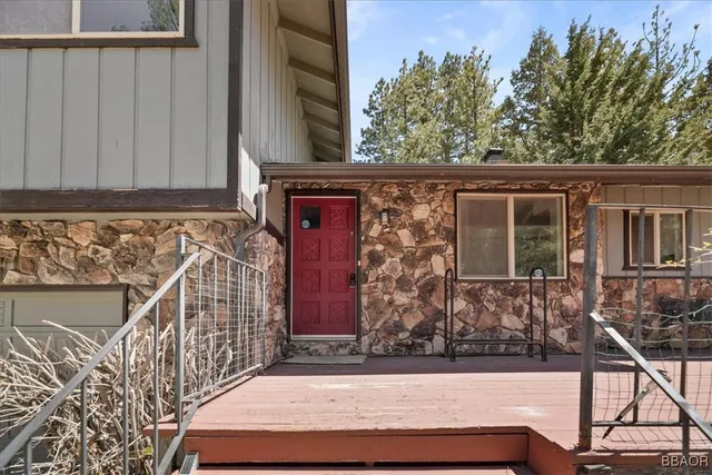 a view of house with large windows