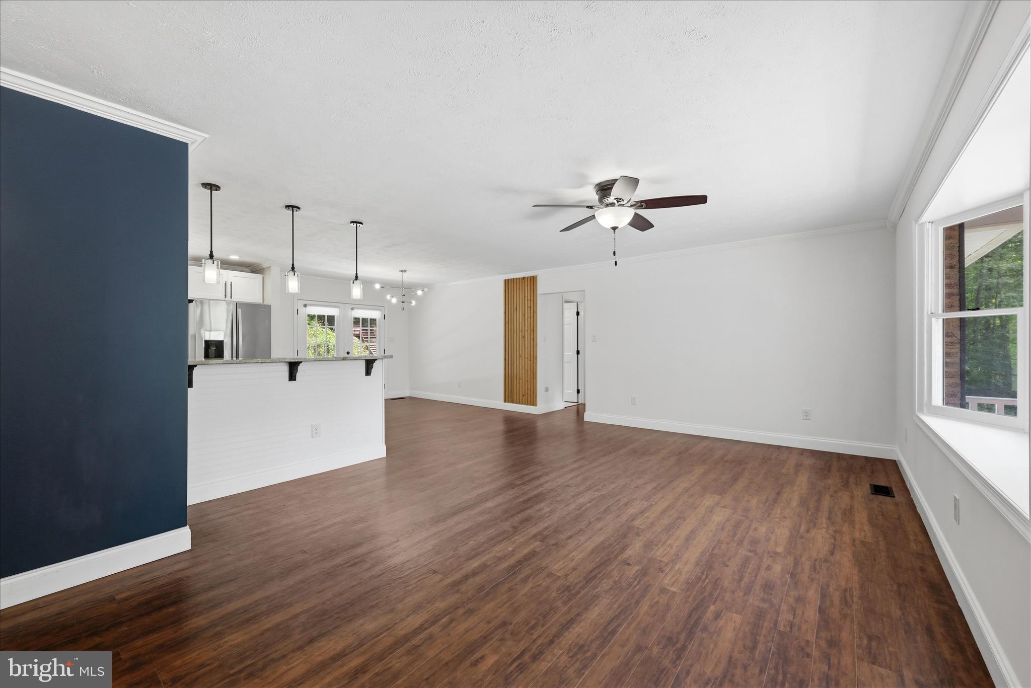 3744 Browntown Road Front Royal, VA 22630 - Photo 17 of 84 a view of a house with a ceiling fan hardwood floor and a ceiling fan
