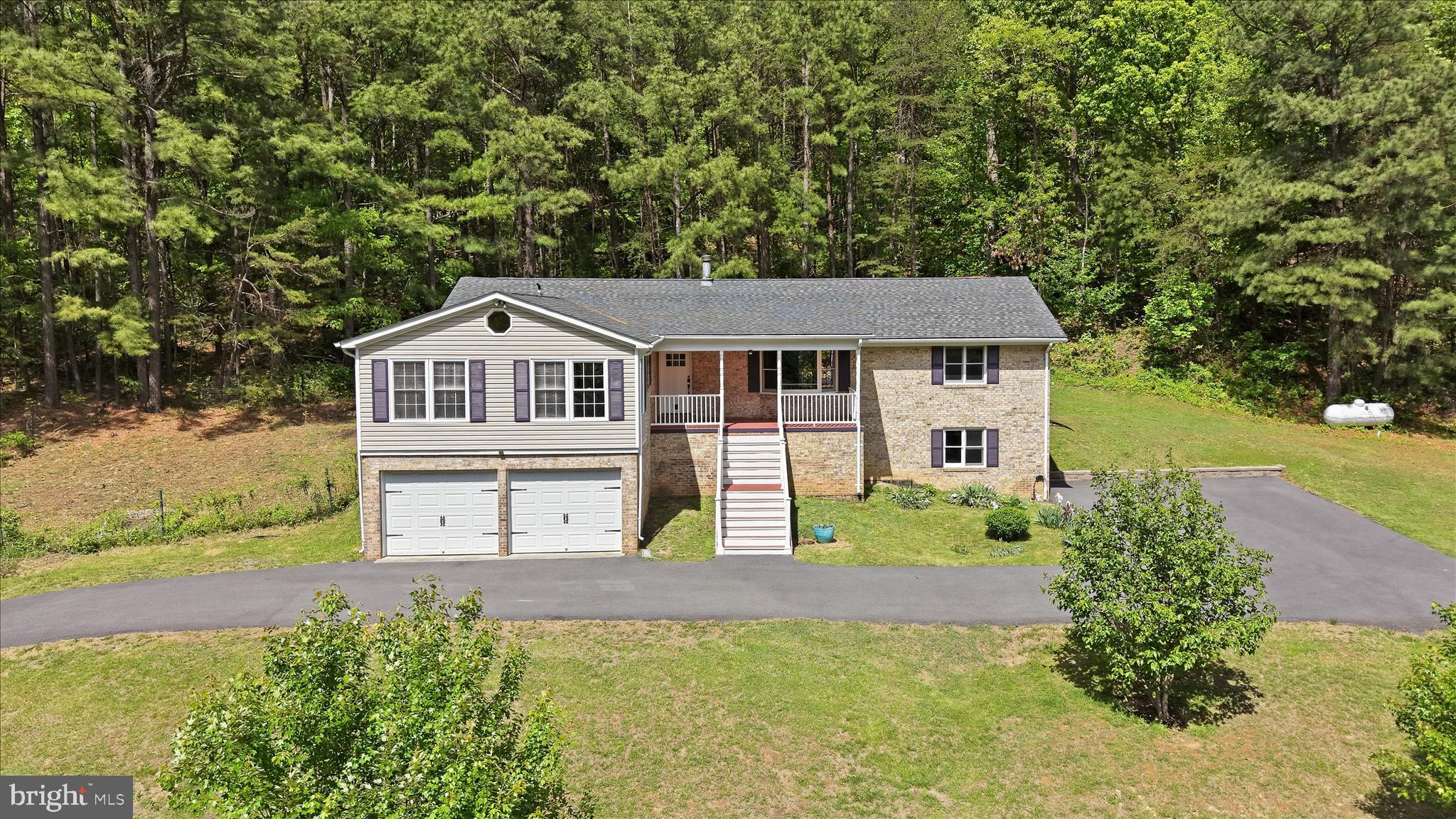 3744 Browntown Road Front Royal, VA 22630 - Photo 2 of 84 a house view with a garden space