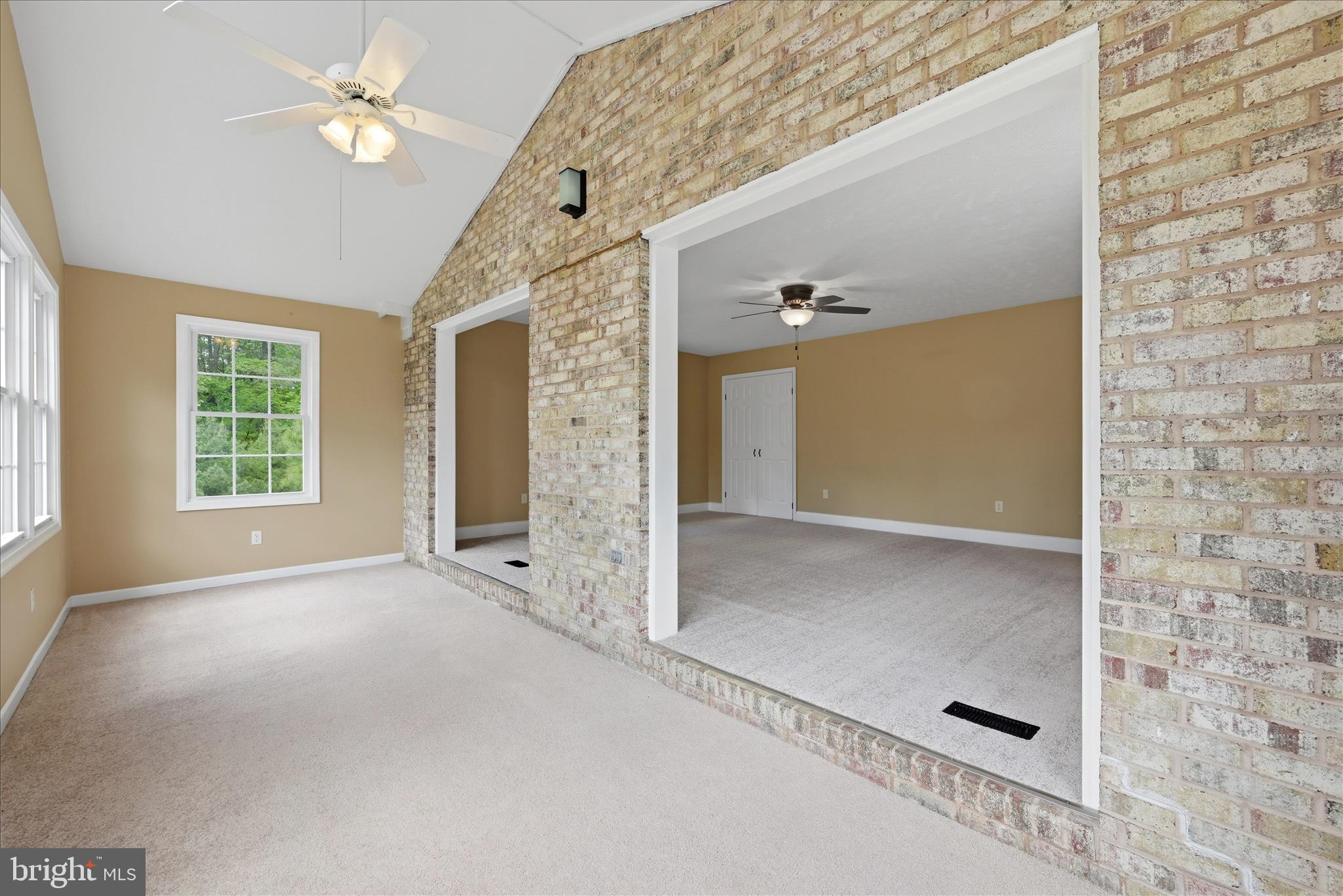 3744 Browntown Road Front Royal, VA 22630 - Photo 31 of 84 an empty room with windows and ceiling fan