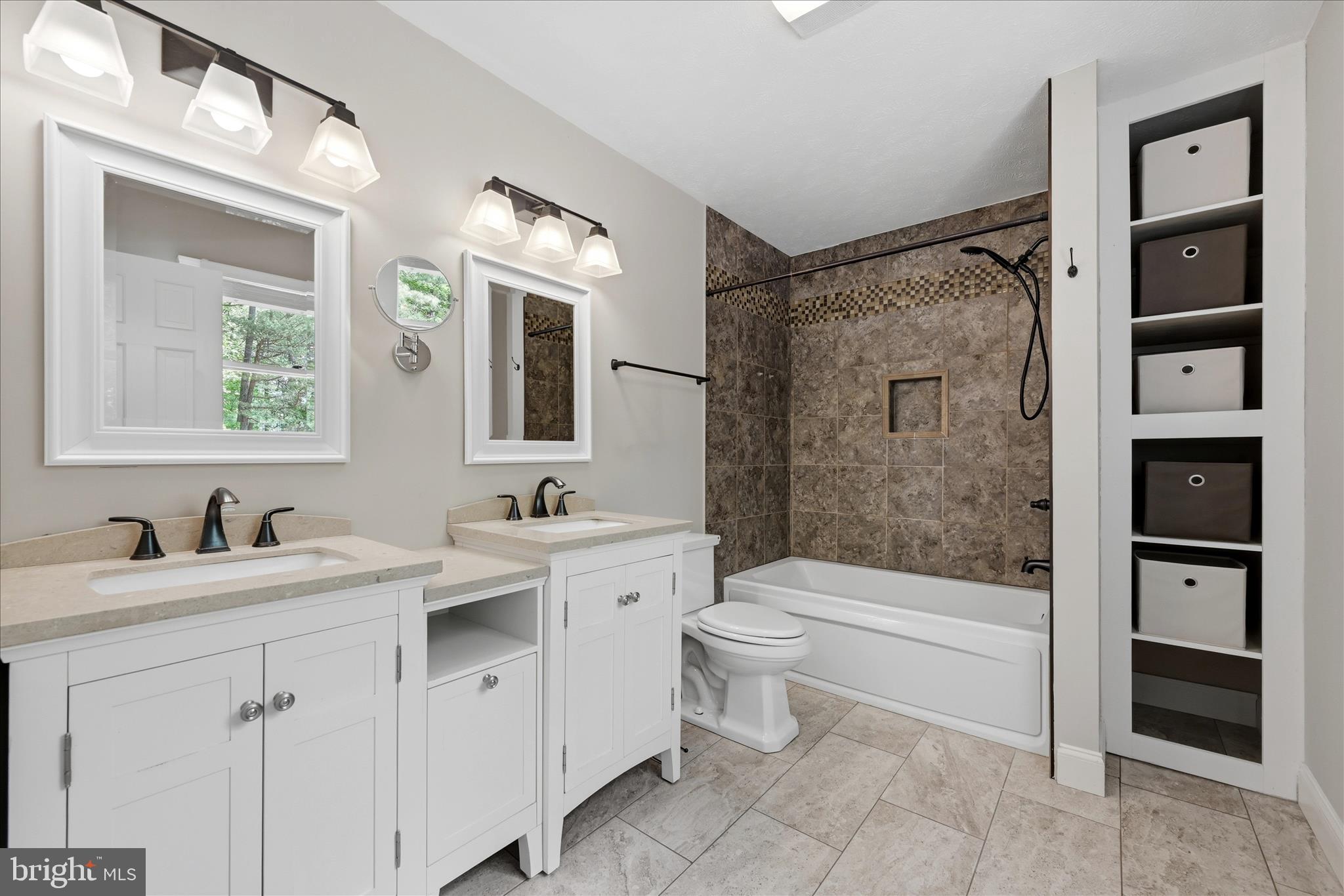 3744 Browntown Road Front Royal, VA 22630 - Photo 36 of 84 a bathroom with a double vanity sink toilet and shower