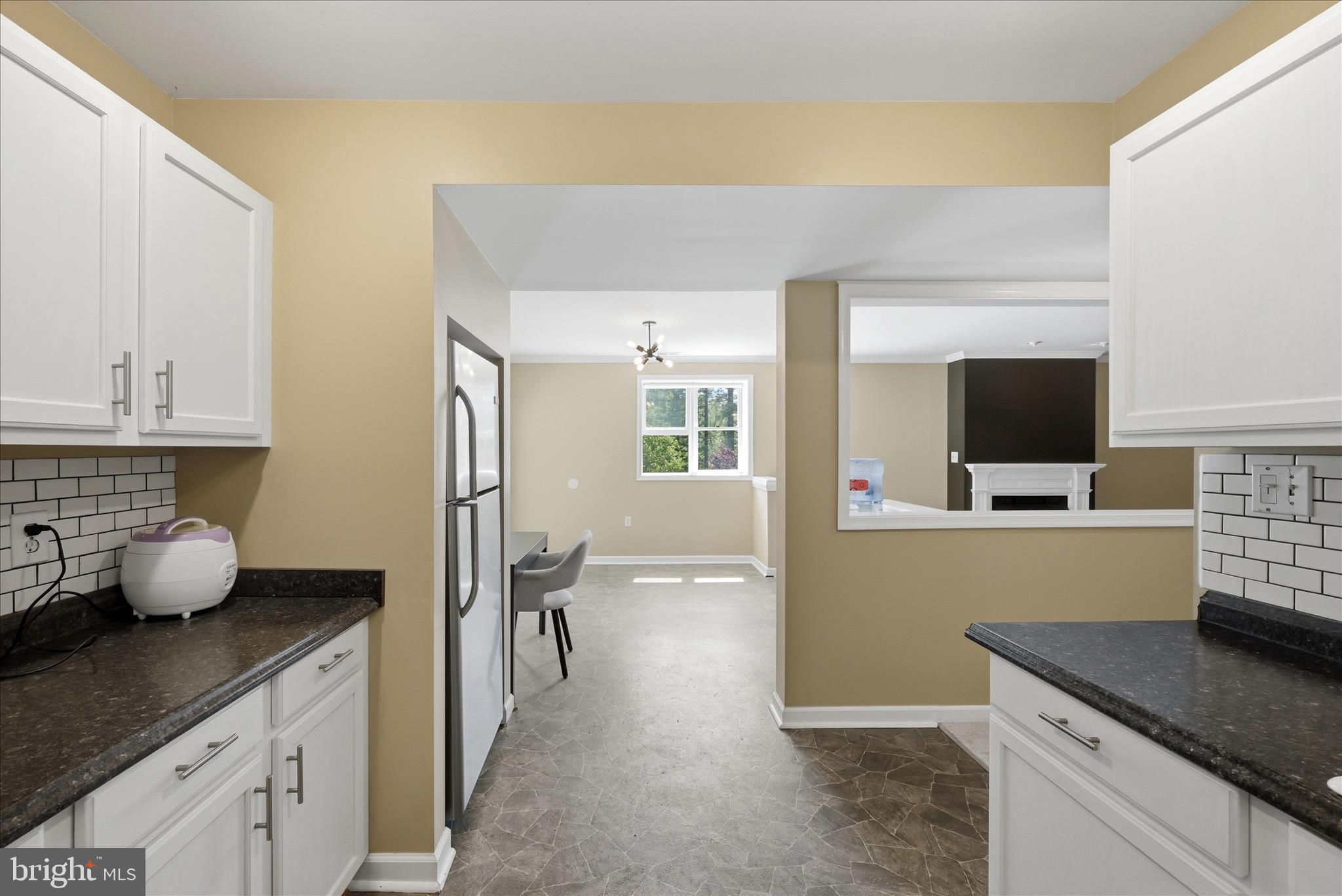 3744 Browntown Road Front Royal, VA 22630 - Photo 62 of 84 a kitchen with granite countertop a sink and a stove top oven