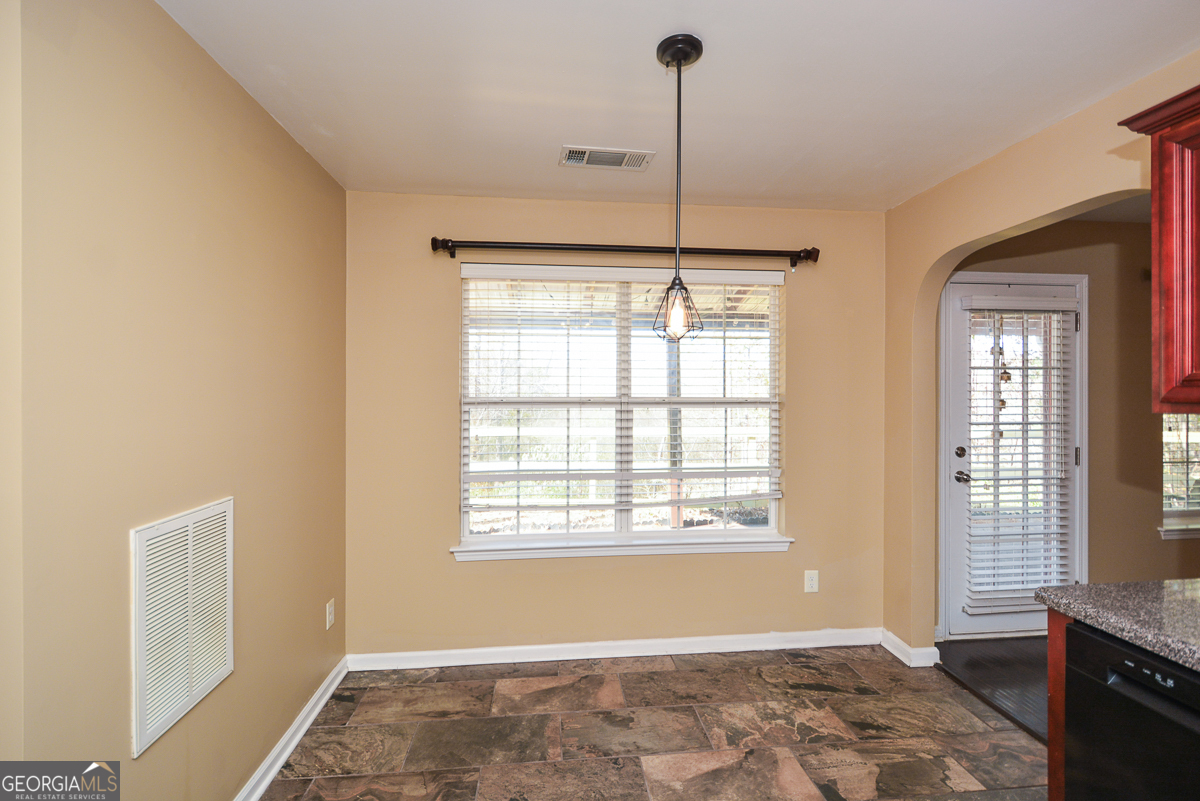 137 Baywood Crossing Hiram, GA 30141 - Photo 21 of 61 a view of an empty room with a window