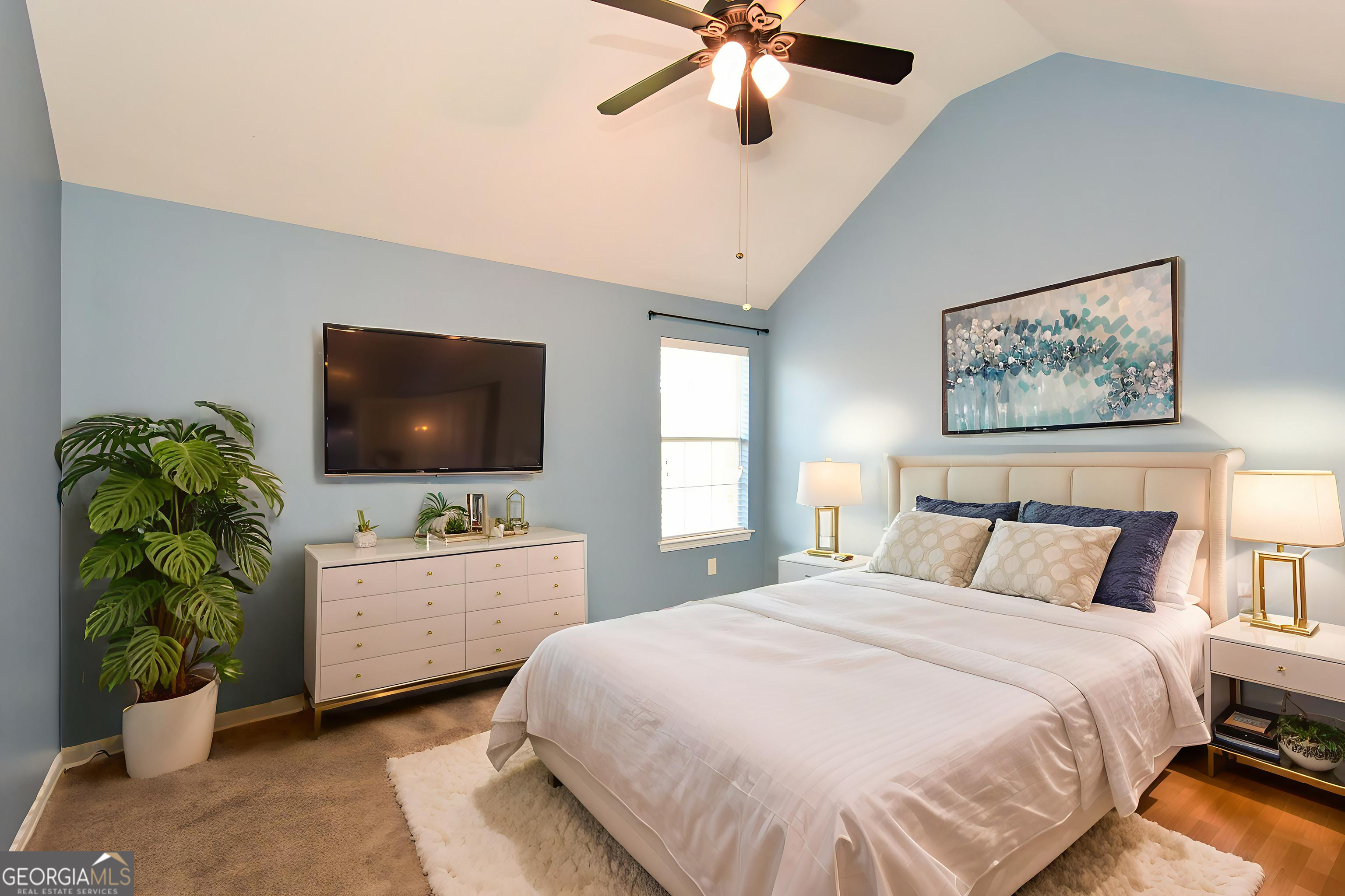 137 Baywood Crossing Hiram, GA 30141 - Photo 36 of 61 a bedroom with a bed and a flat screen tv