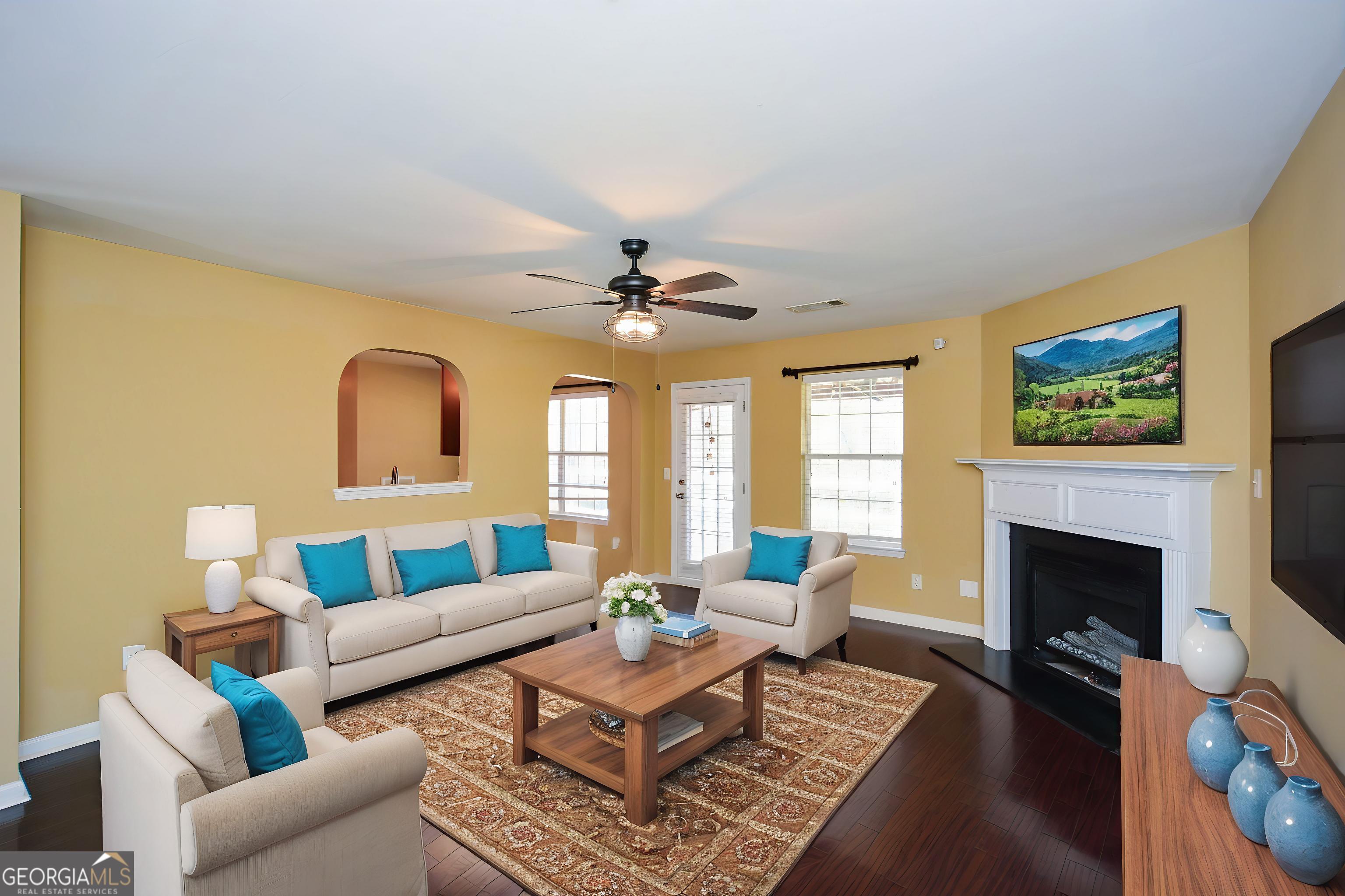 137 Baywood Crossing Hiram, GA 30141 - Photo 10 of 61 a living room with furniture and a fireplace
