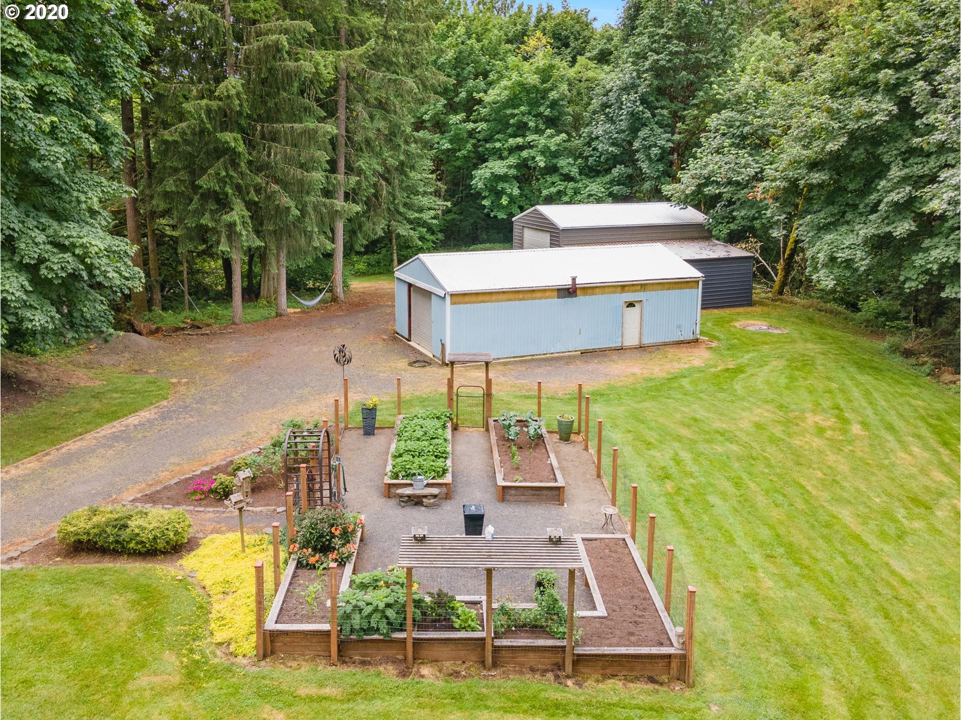 21835 Northwest Beck Road Portland, OR 97231 - Photo 4 of 32 a view of a yard with furniture